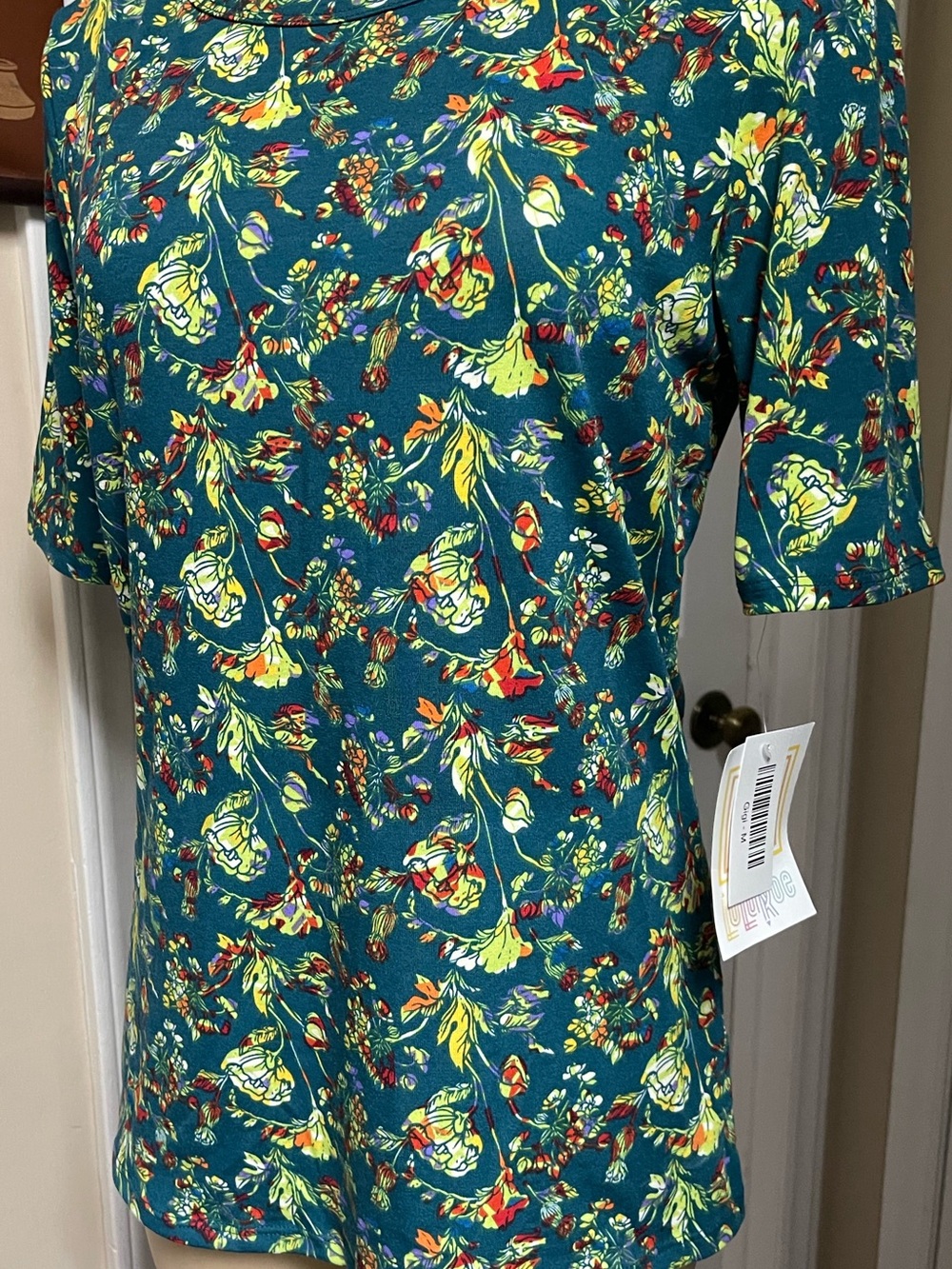LuLaRoe Teal Floral Gigi Top with Yellow & Red Accents